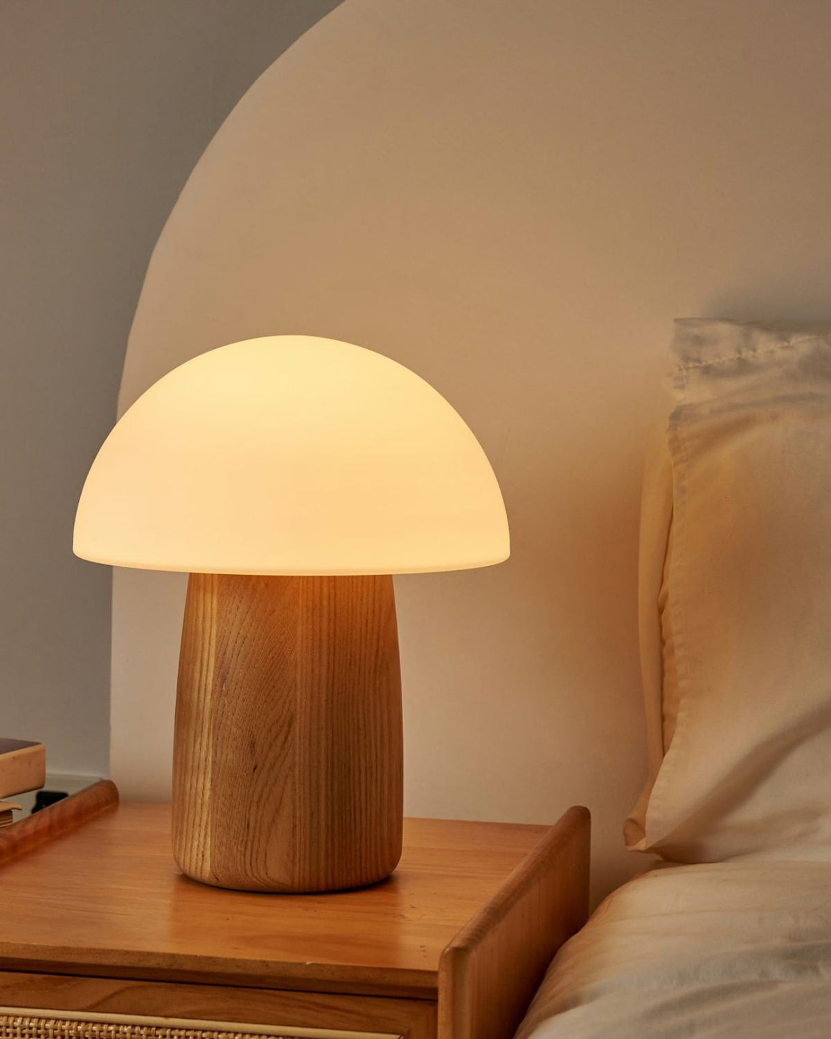 The Alice Mushroom Lamp can light up your kid's space with vibrant and vivid colours, or set a relaxing mood with soft, muted tones.  This portable lamp is White Ash Wood or Natural Walnut Wood with a frosted, milky white glass shade. You can recharge it through the USB-C port in the back in no time.  Switch between 7 soft RGB lights and the warm white light mode with a gentle tap on the mushroom glass shade or simply keep tapping until you find your favourite colour to suit your kid's mood!