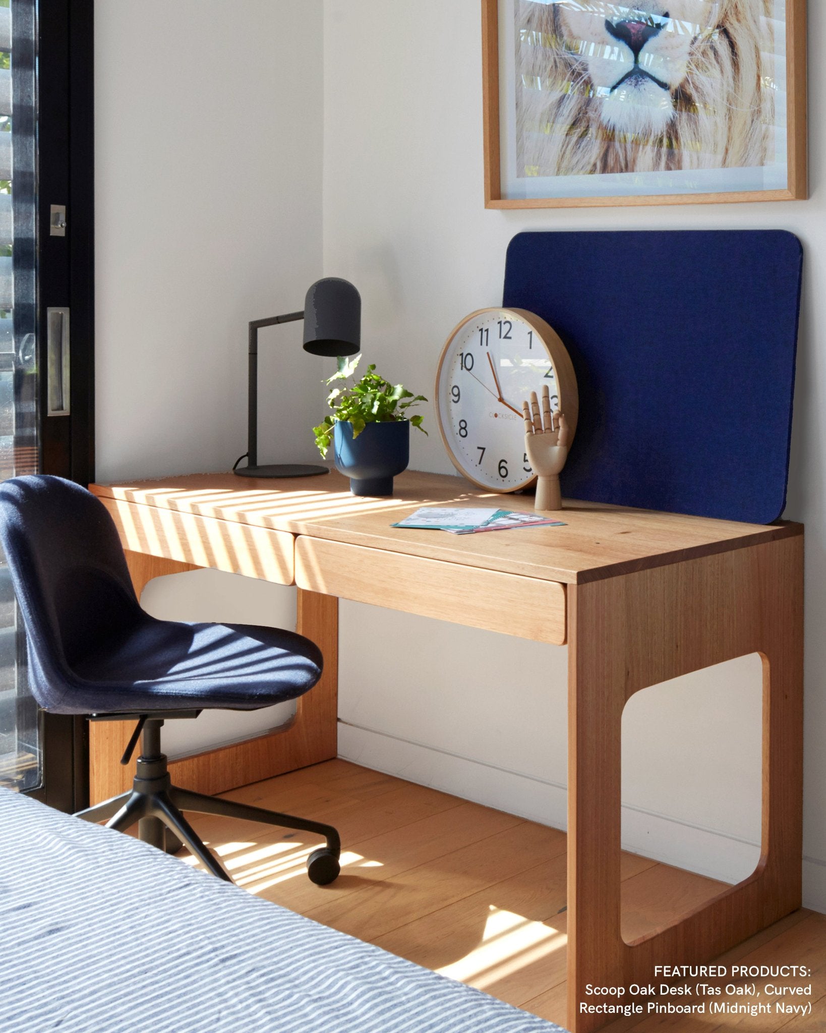 Curved Rectangle Pin Board in a home office, providing a stylish and practical way to pin notes, ideas, and inspiration.