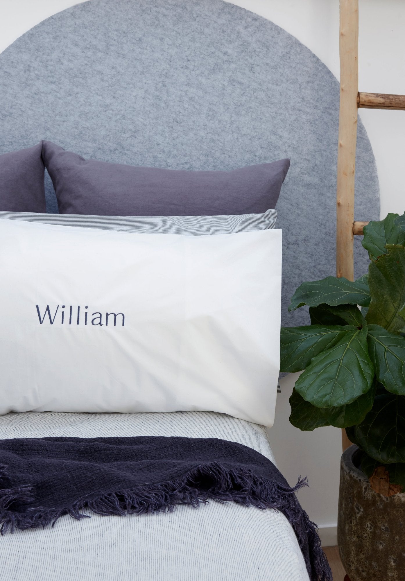 A Large Round Pin Board in a children's bedroom, a practical and stylish way to display photos and artwork.