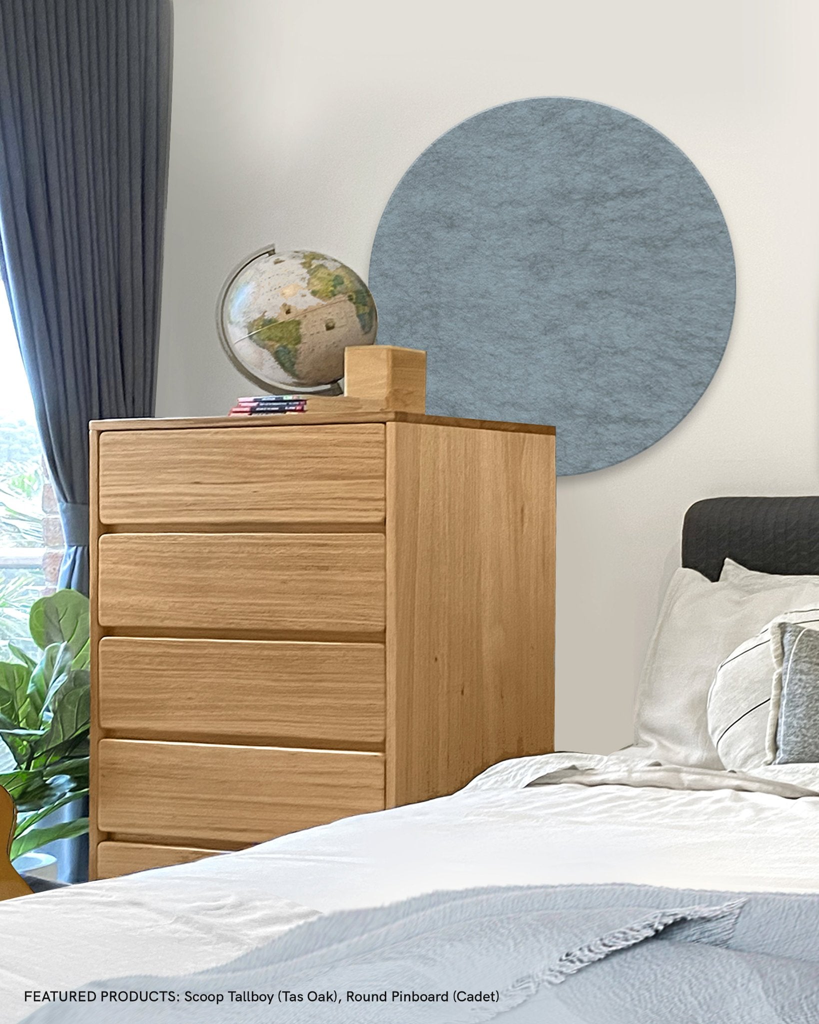 A large round pin board in a kids bedroom, perfect for keeping homework reminders, notes and creative ideas