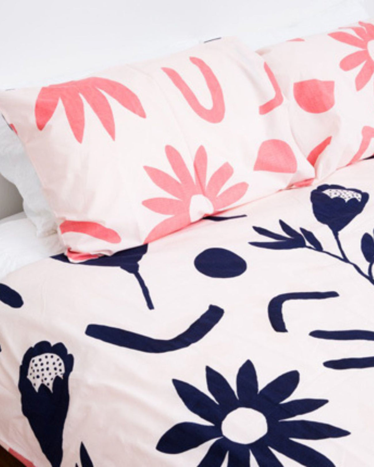 This beautiful floral dreams duvet set is fresh look for your kid's bedrooms. With a reversible print of pink/navy on one side and pink/watermelon on the other.  100% cotton.  Size:  Single (set includes 1 x duvet cover plus 1 x pillowcase)  Double (set includes 1 duvet dover plus 2 pillowcases)