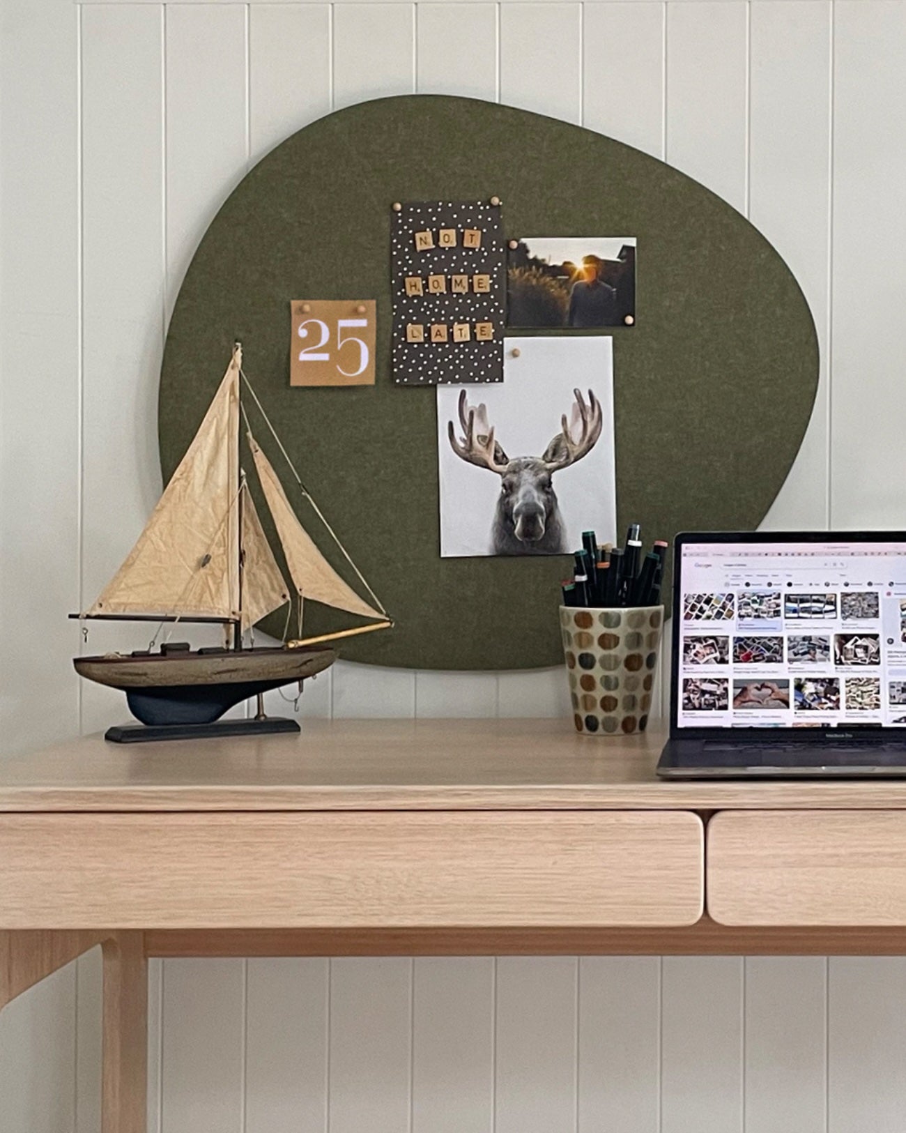 Soft-touch pebble pin board in a neutral tone, offering stylish wall organization for homes and offices. Free Freight.