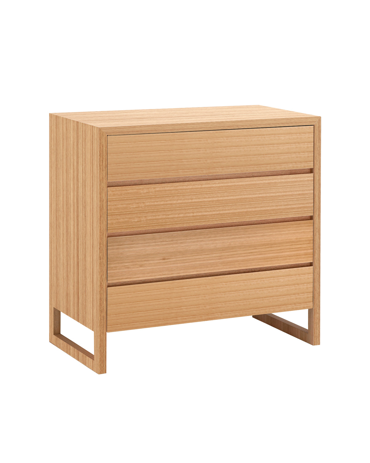 The Oak Box Chest of Drawers features a timber frame which encases itself around four timber drawers, concealing intricate mitred joinery with legs that flow into a continuous wrap to create classic simplicity.