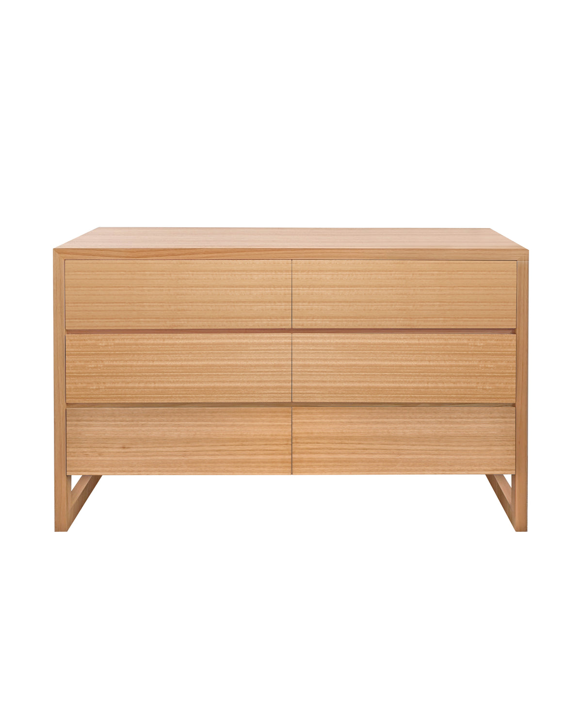 Oak Box Lowboy features a timber frame which encases itself around six timber drawers. Concealing intricate mitred joinery with legs that flow into a continuous wrap, to create classic simplicity.