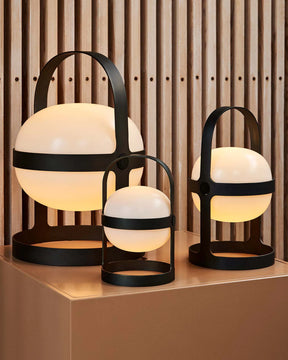 Create a cosy atmosphere for kids indoors or outdoors with this portable lantern. Use it on the verandah, around the pool, in a bookcase or next to your kids bed. The floating, moon shaped ball, is encased in a powder coated metal frame which protects the light and acts as a base and handle. The lamp can be charged with either USB or solar energy.