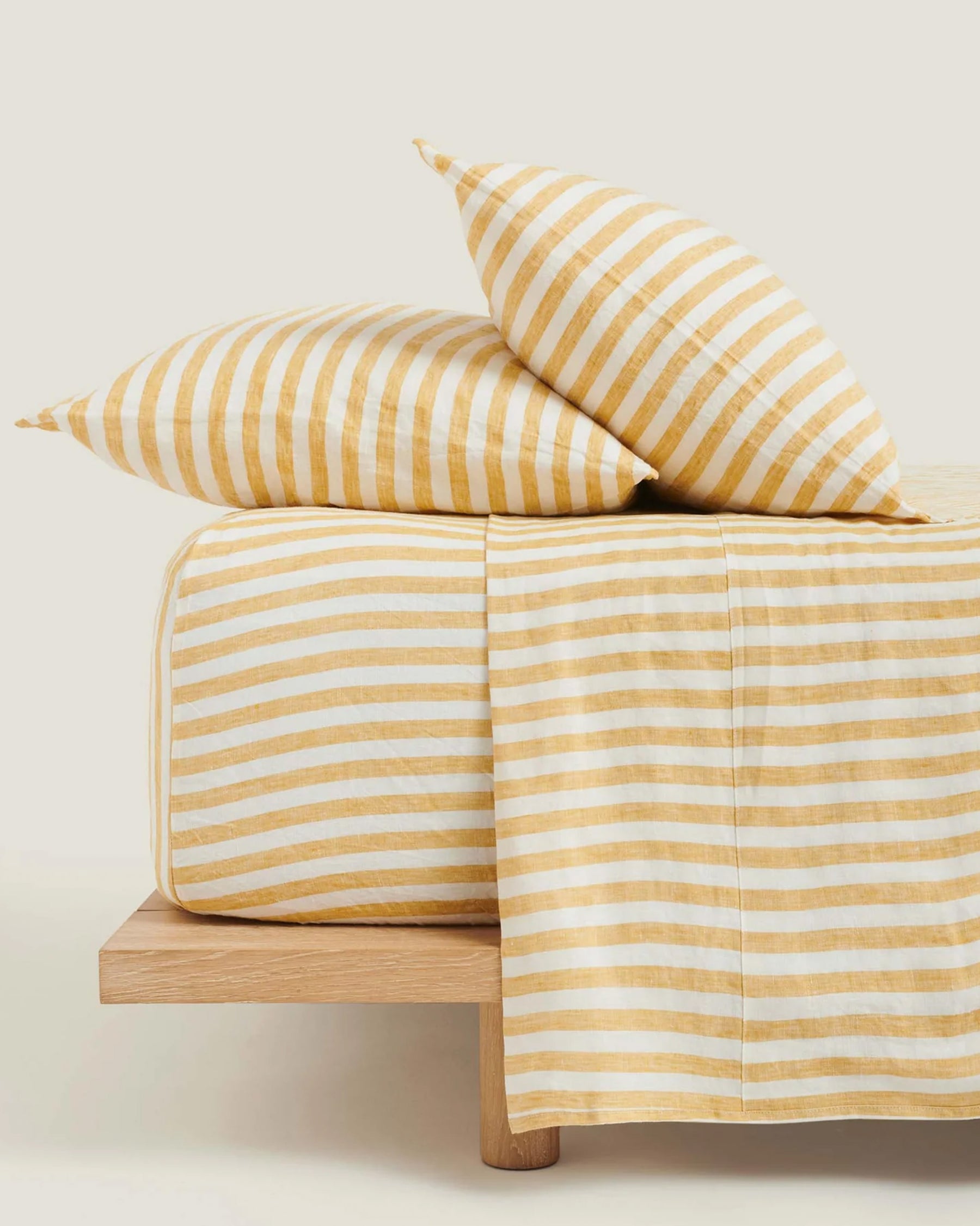 Make your kids bed the comfiest place with this 100% French Linen Fitted Sheet in Wide Natural Stripes. Made from 100% European French flax. Designed to coordinate with Yellow Stripe Flat Sheet and Pillowcase to create a sheet set.