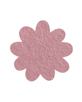 Pink daisy shaped pinboard on a white background