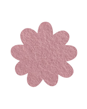 Pink daisy shaped pinboard on a white background