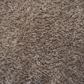Sami is a soft, fur-like faux fabric with a dense, luxurious feel. Made from long, wavy yarns, it has a natural, fleece-inspired texture and beautiful suppleness—perfect for cushions, throws, and decorative accents.