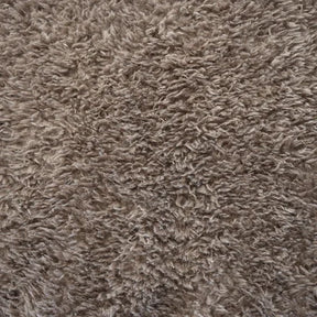Sami is a soft, fur-like faux fabric with a dense, luxurious feel. Made from long, wavy yarns, it has a natural, fleece-inspired texture and beautiful suppleness—perfect for cushions, throws, and decorative accents.