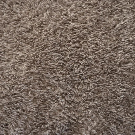Sami is a soft, fur-like faux fabric with a dense, luxurious feel. Made from long, wavy yarns, it has a natural, fleece-inspired texture and beautiful suppleness—perfect for cushions, throws, and decorative accents.
