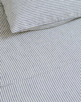 Make your kids bed the comfiest place with this 100% French Linen Flat Sheet in with a classic blue stripe. Made from 100% European French flax; Stonewashed with extra soft finish: 165 g/m: GOTS certified.
