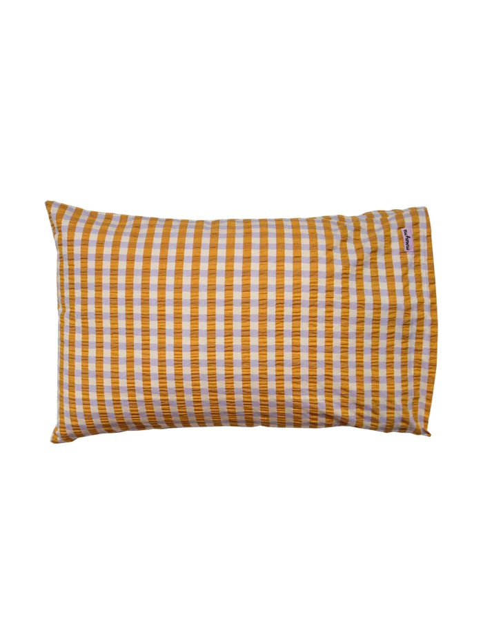 The Mango Seersucker Standard Pillowcase Set is woven from 100% combed cotton for a soft texture, this pillowcase set features a small-scale check pattern in warm mango, soft lilac and classic cream. The result is a timeless and contemporary design that creates a warm look for kids bedrooms.
