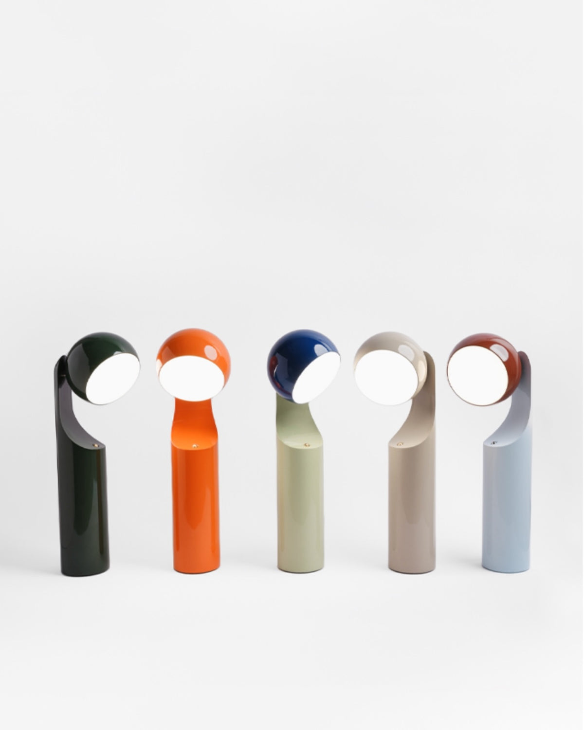 Refresh your kids reading nook with this portable lamp featuring a cylindrical silhouette with a bubblegum-shaped shade that rotates to illuminate every angle. The design of the Mono Portable Reading Lamp is inspired by ancient Chinese figurines called Zuo Yi which is a greeting gesture that represents humility. 