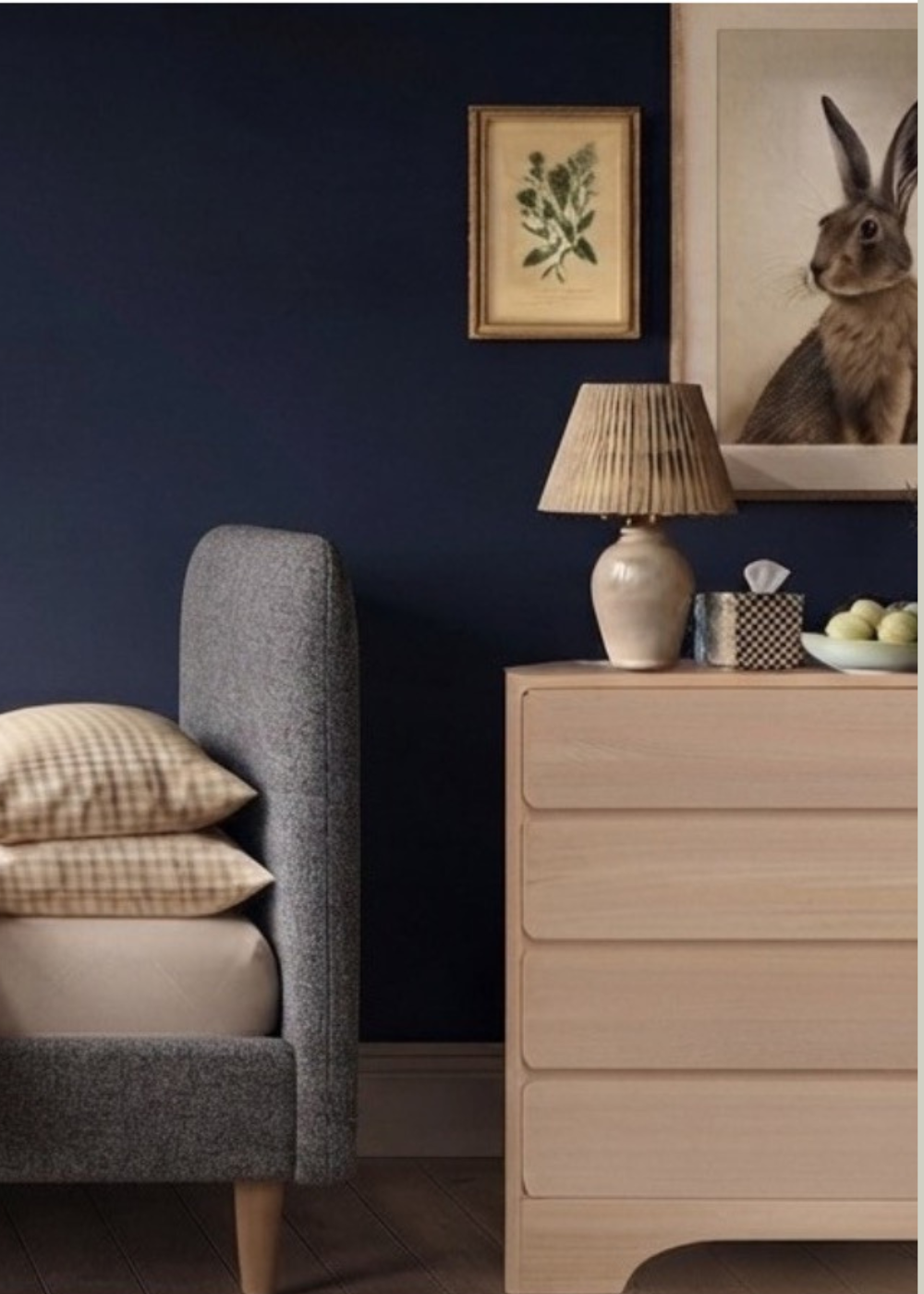 Scoop upholstered single bed in luxury woollen fabric and solid oak chest of drawers in a contemporary bedroom.
