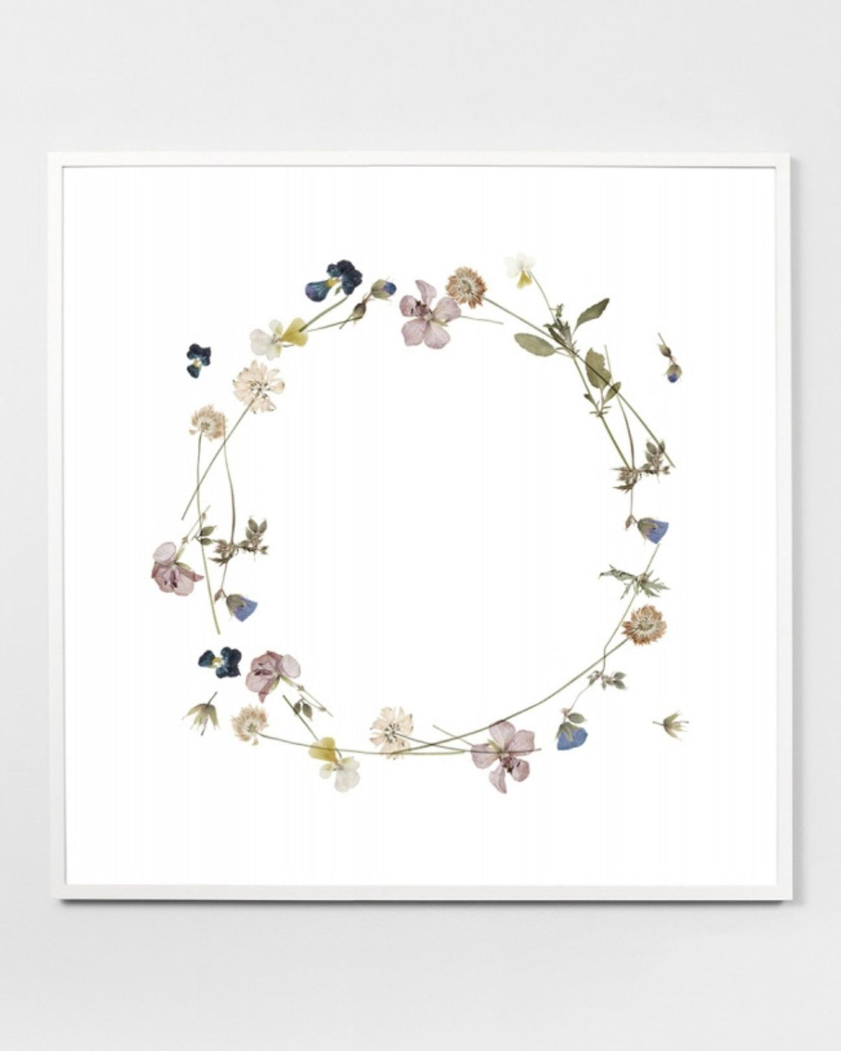 This delicate print will make a statement in any kids space. With delicate spring florals arranged in a wreath. This framed print is strung with cord and ready to hang. Made in Australia. 83W x 83H x 4D cm