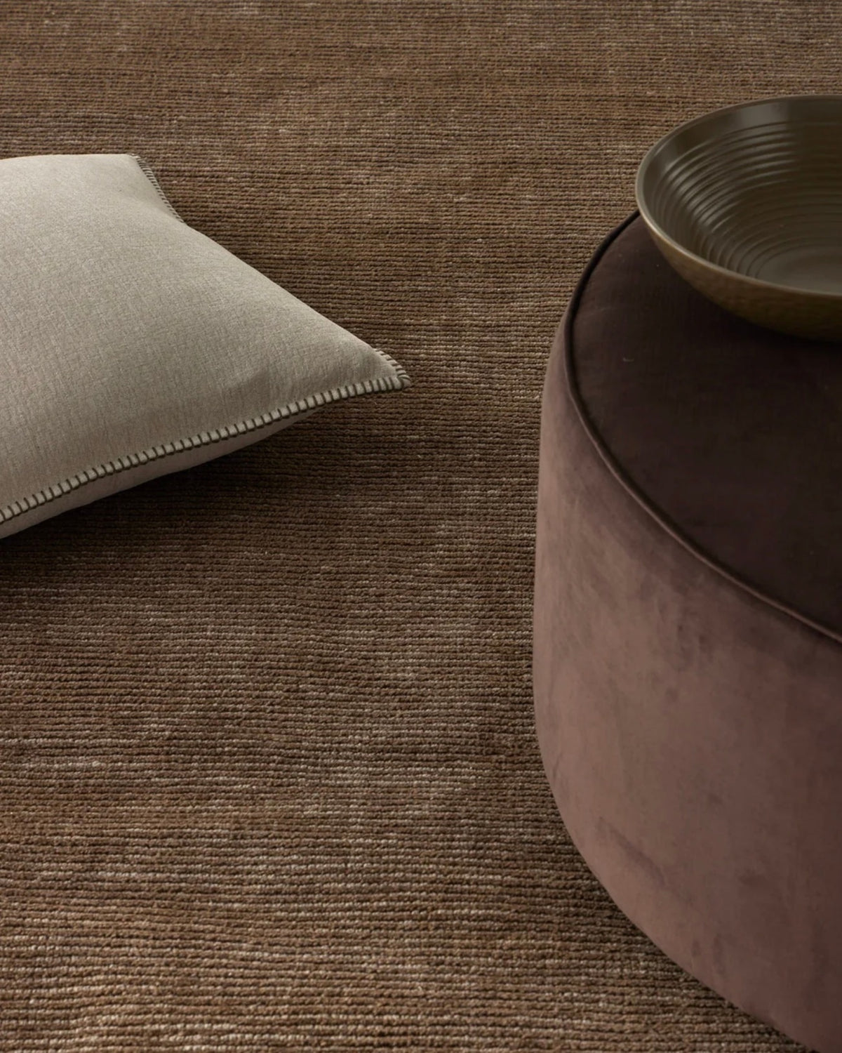 UPHOLSTERED OTTOMAN