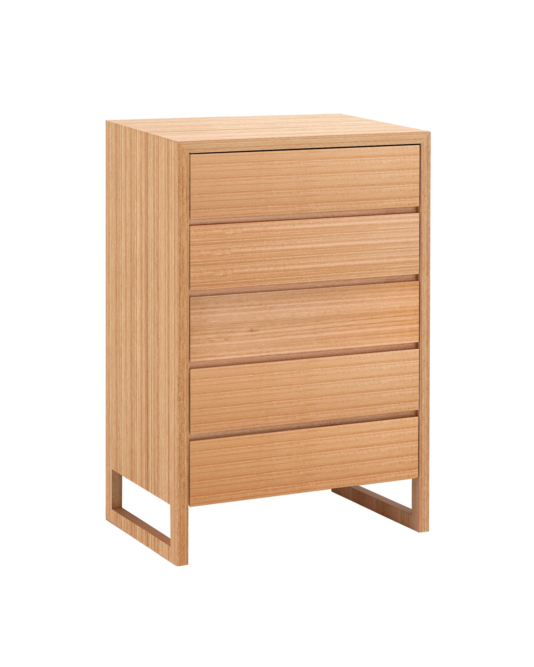 The Oak Box Tallboy features a timber frame which encases itself around five timber drawers, concealing intricate mitred joinery with legs that flow into a continuous wrap to create classic simplicity.